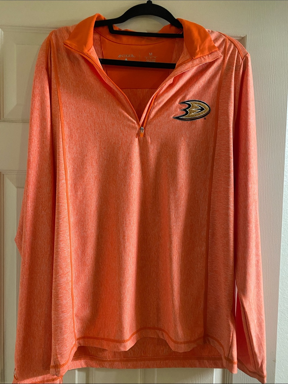 Antigua Orange Quarter-Zip Pullover with Team Patch